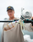 Nomad Design Squidtrex Patented Vibrating Fishing Lure- Scent Added TPE Soft Plastic Lure for Saltwater w/Strong BKK Assist Hooks, Fishing Bait that Catches Many Species, 130mm 5" 3 1/4oz- White Glow